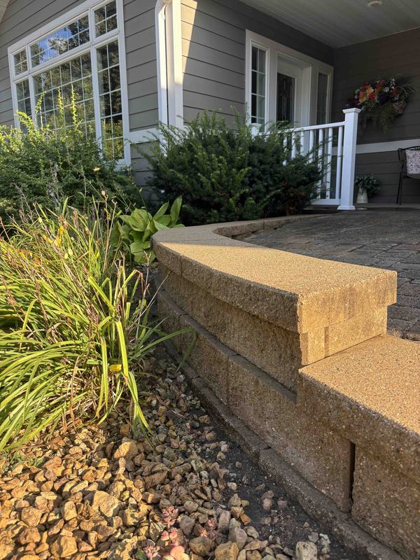 Retaining wall and steps after power washing, clean and bright
